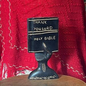 carved wooden hand holding a wooden bible 8.5” tall 4.5” wide vintage